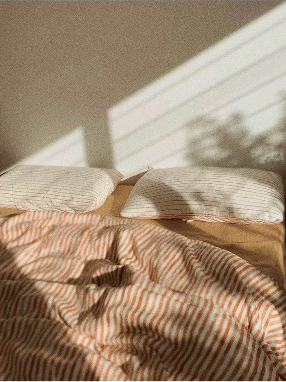 Striped Quilted Comforter in Peach and Cream